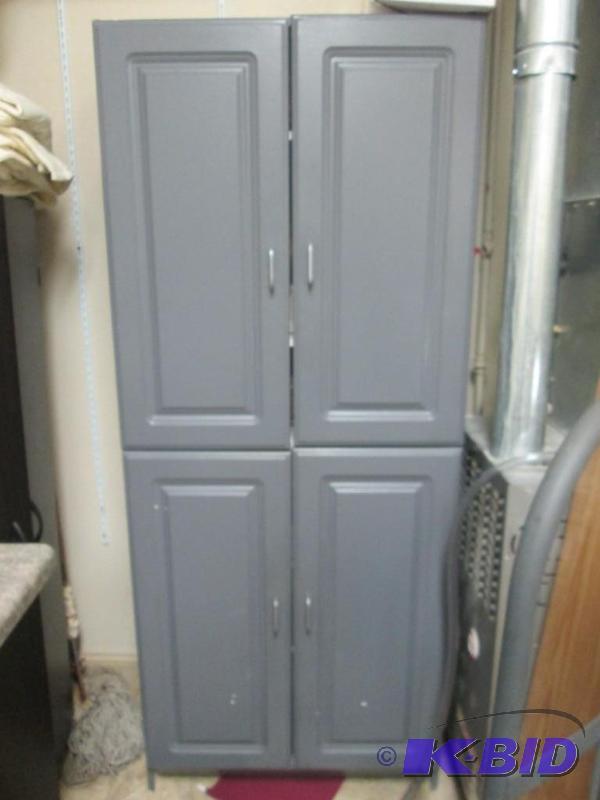 lot 56 image: Grey 4-Door Cabinet