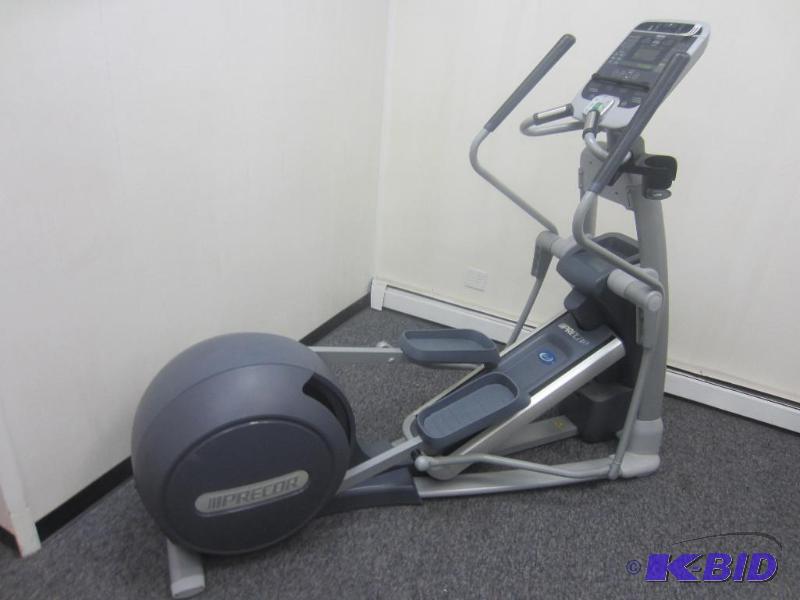 lot 11 image: Precor 576i Commercial Elliptical.  Power Incline ramp and moving arms.