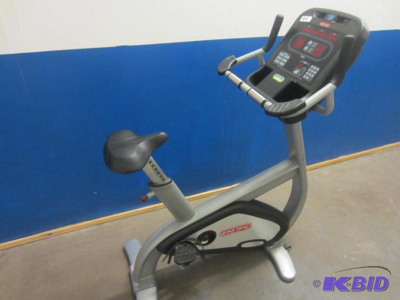 lot 24 image: Star Trac E UB Upright Exercise Bike.  Commercial Grade