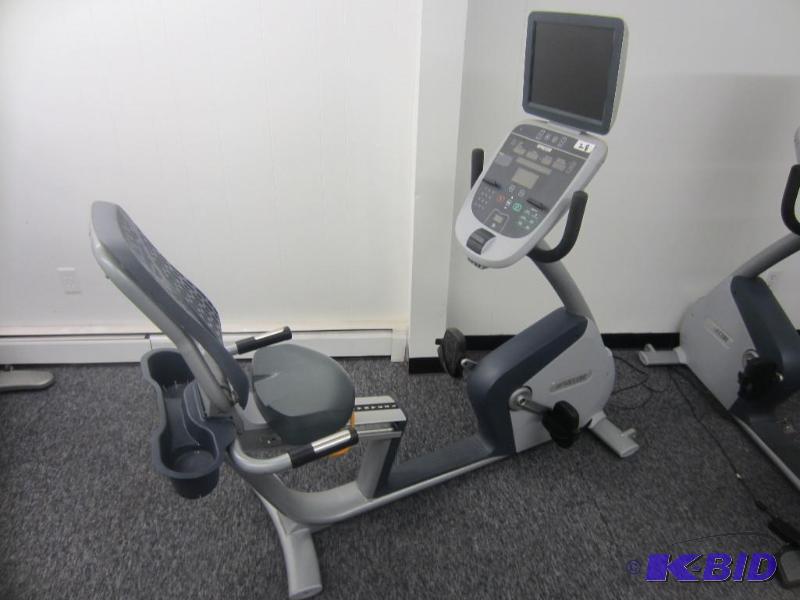 lot 28 image: Precor 835 Recumbent Bike.  Mesh seat, Step thru, TV package