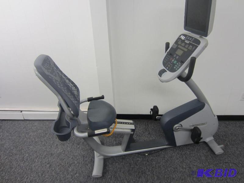 lot 29 image: Precor 835 Recumbent Bike.  Mesh seat, Step thru, TV package