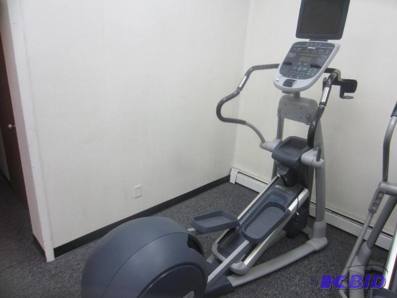 lot 9 image: Precor 833 Incline Elliptical trainer.  W Cardio theater TV package.