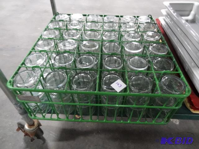 lot 143 image: Metal Dish Rack with 72 Orange Juice Glasses....
