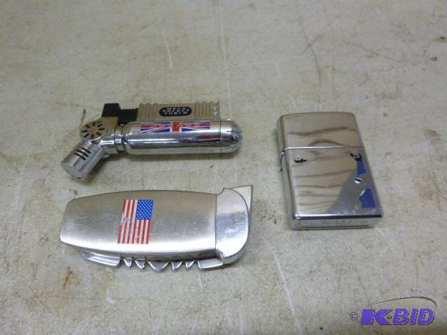lot 124 image: Three Lighters...