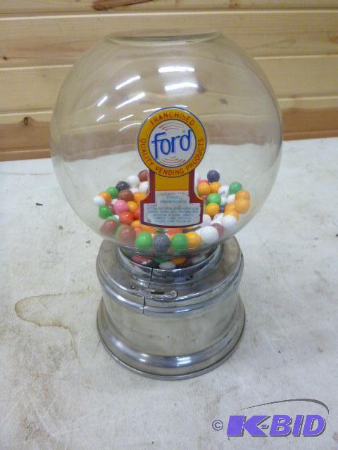 lot 133 image: Ford Gum Ball Machine Some gum in ball, teste...