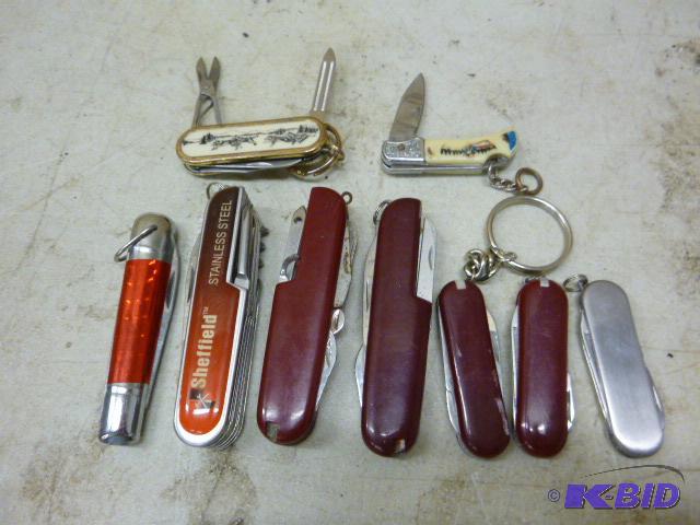 lot 25 image: Nine Miscellaneous Pocket Knives...