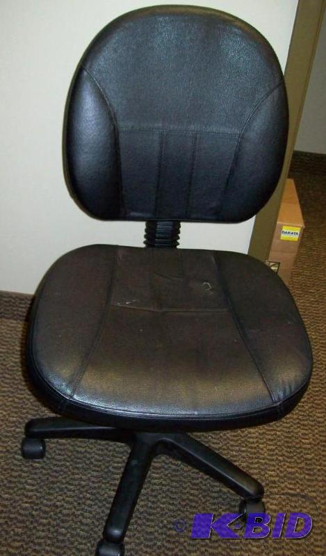 low back office chair - small tear in upholst...