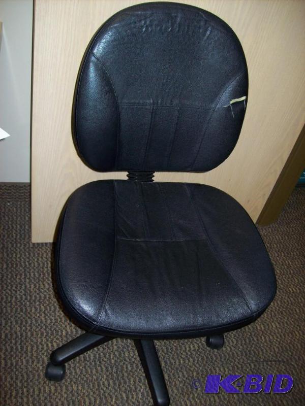 low back office chair - small tear in upholst...