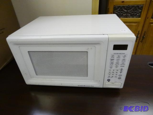 lot 116 image: GE Microrwave Model JES1033WB001. Jan. 2001. ...