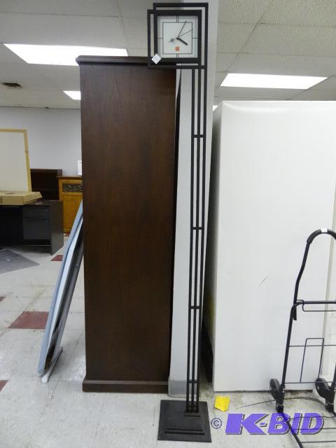 lot 129 image: Bulova Quartz Clock on Metal Stand. 78" ...