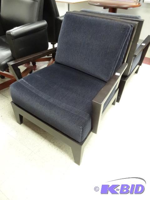 lot 23 image: Wood Framed Cushioned Lounge Chair. Excellent...