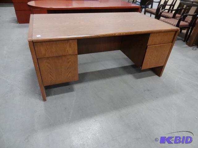 lot 253 image: Wood Office Desk. 4 Drawer 66 X 36 X 29...