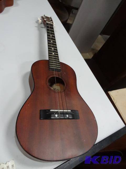 lot 268 image: Hilo Model 2655 Guitar. Looks to be Childrens...