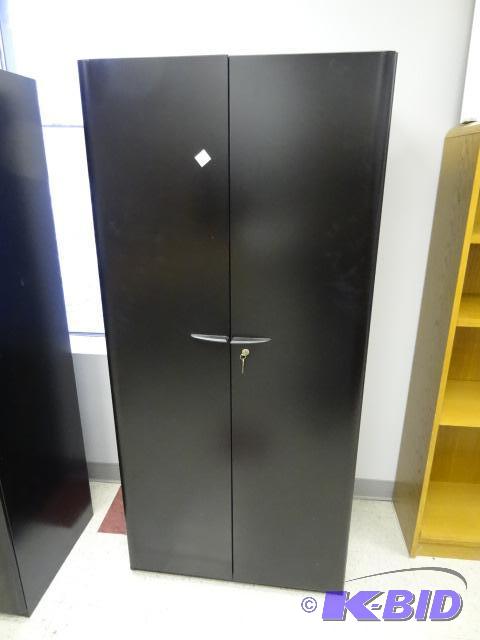 lot 7 image: Metal 2 Door Cabinet. 3 Shelves. 30 X 19 X 65...