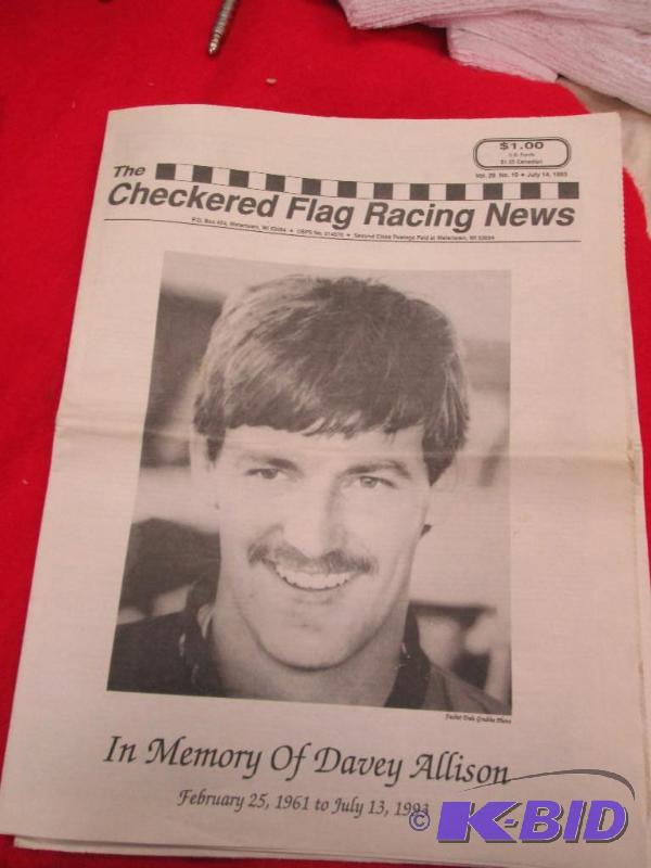 lot 16 image: Checkered flag facing news In Memory of Davey...
