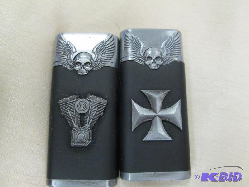 lot 212 image: Qty 2 Novelty lighters silver and black color...