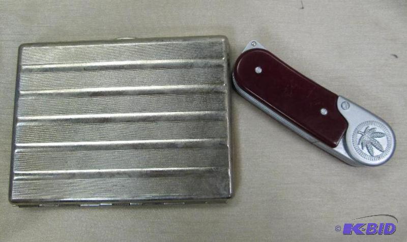 lot 220 image: a Knive and thing to carry smokes in...