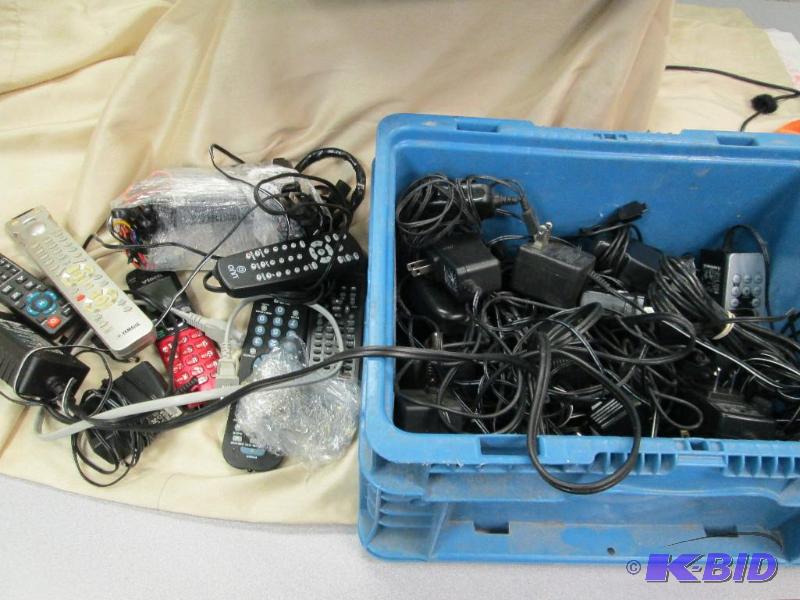 lot 234 image: assortment of cords , remote and other things...