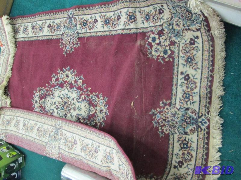 lot 237 image: Large area rug in fair condition...