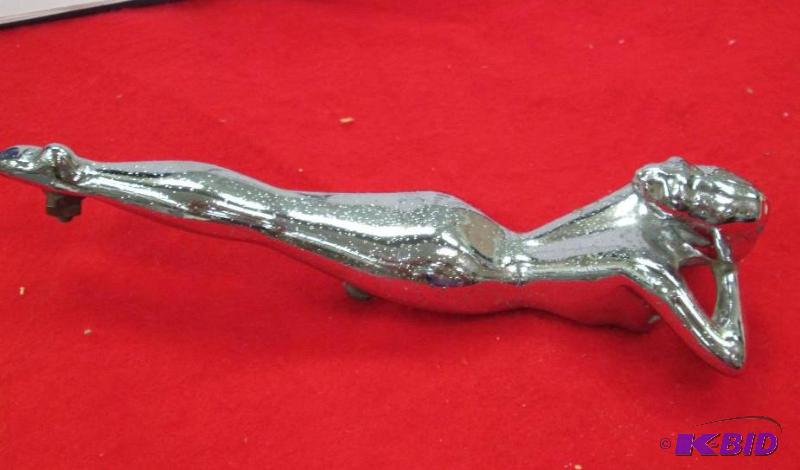 lot 37 image: A metal lady that could be put on a truck...