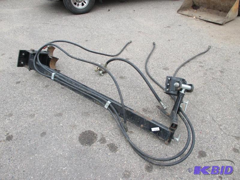 auger arm with hydraulic hoses...