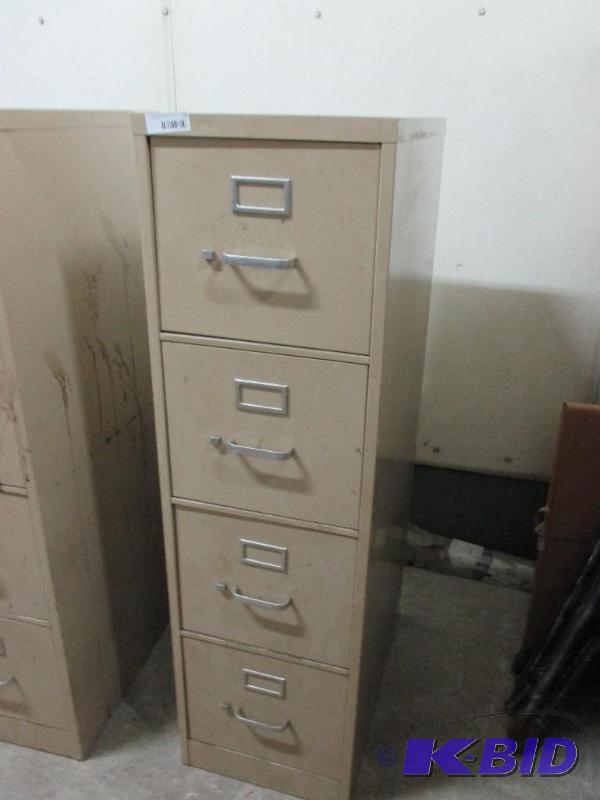 4 drawer file cabinet with manuals...