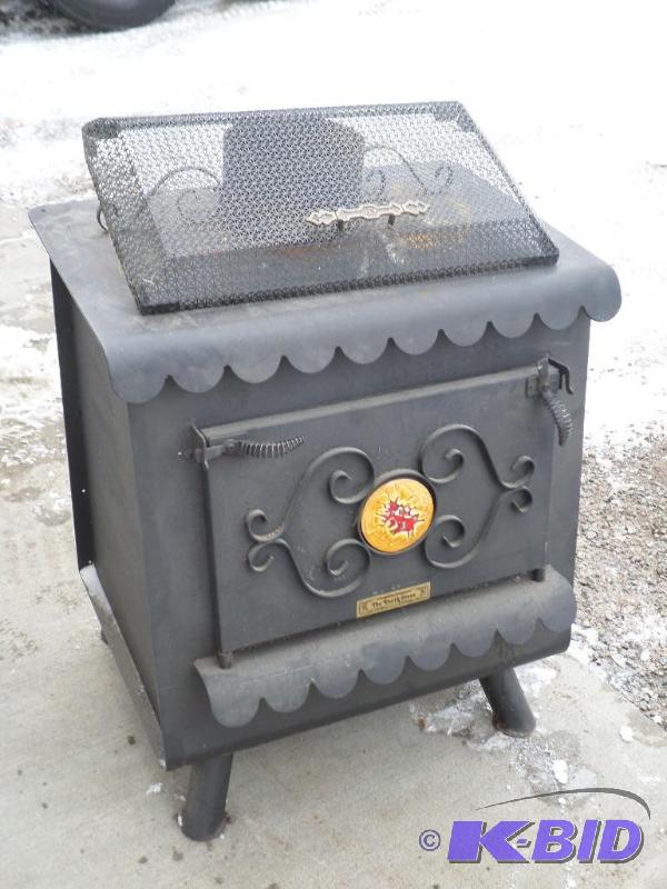 lot 30 image: &quotThe Earth Stove" Cast Iron Wood St...