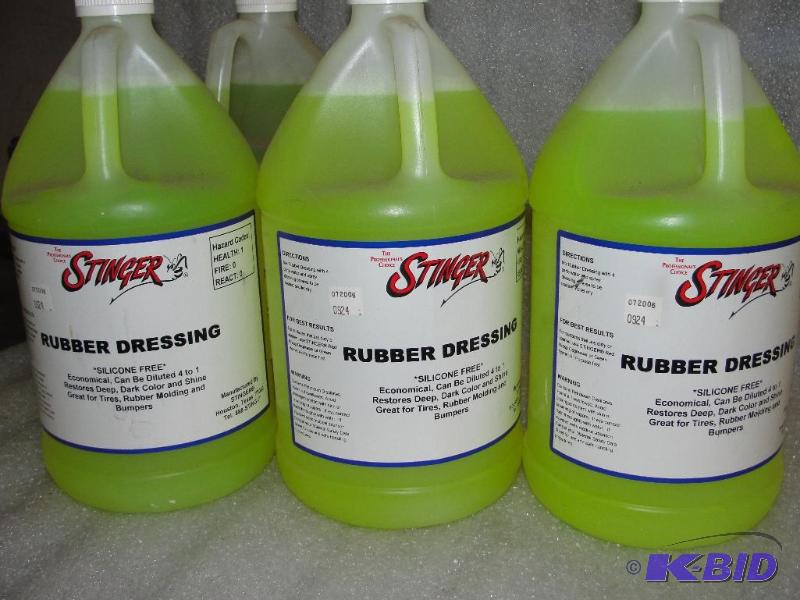 lot 60 image: 4 gals. Rubber Dressing...