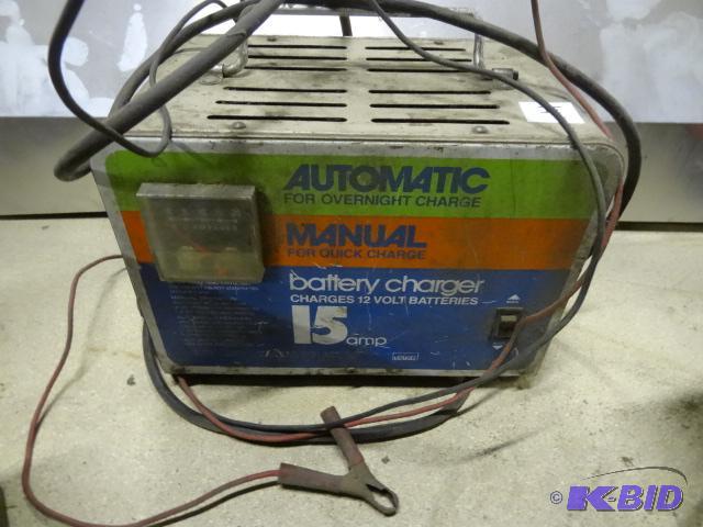 lot 14 image: Montgomery Ward 15 amp battery charger...