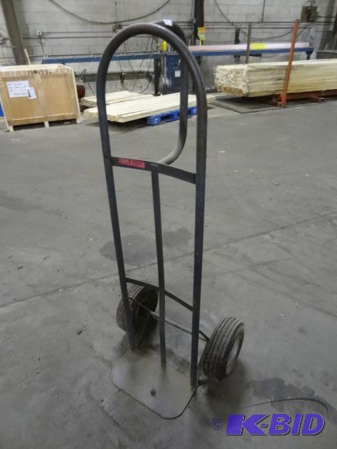 lot 52 image: Metal 2 wheeler with ballon tires....