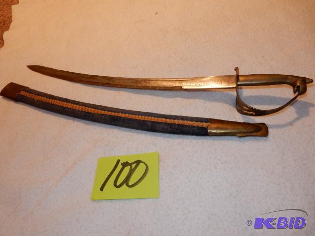 lot 100 image: Sword, made in India.. Brass handle.. 24in L...