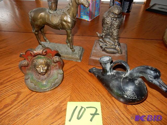 lot 107 image: Misc. Decorative items   Horse candle holder ...