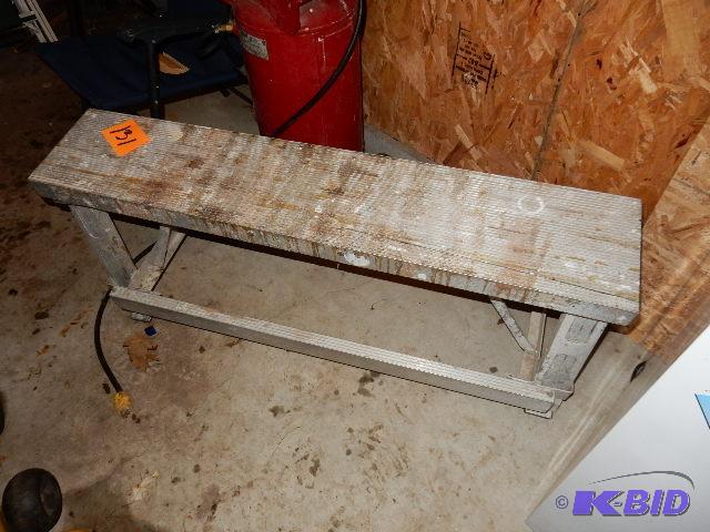 lot 131 image: ALUMINUM Bench.. Folds for storage. .Has cut ...