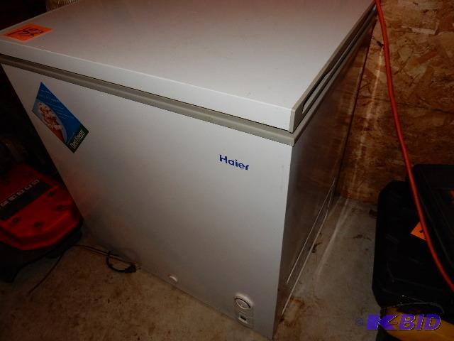 lot 133 image: HAIER 5 Cu. Ft. Chest Freezer.. Dark in the b...