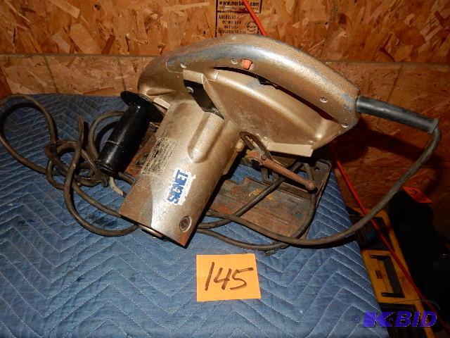 lot 145 image: MAKITA 10 14 in Saw.. It must have a short a...