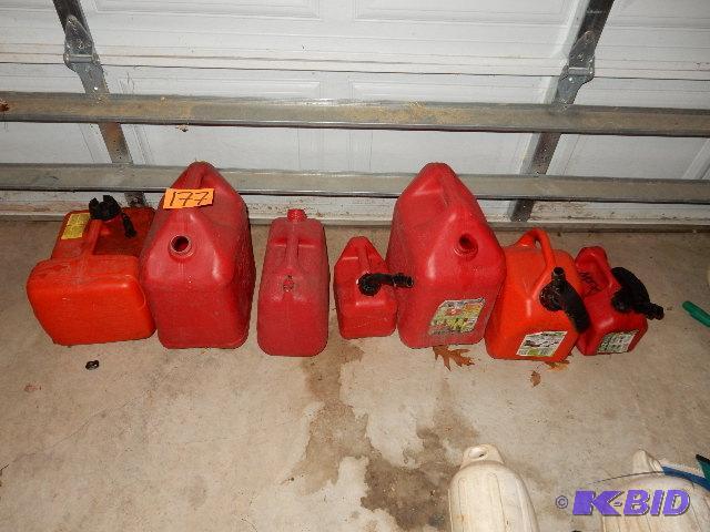 lot 177 image: 7 gas containers. Plastic. Some are missing t...