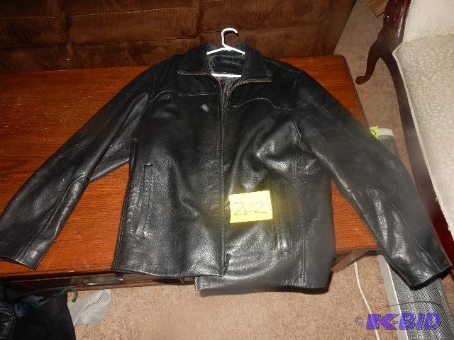 lot 202 image: Calvin Klein, Leather coat. XL size.. VERY NI...