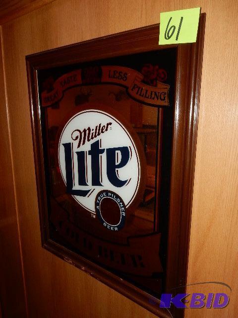 lot 61 image: Miller light mirrored sign 28 in x 34 in....