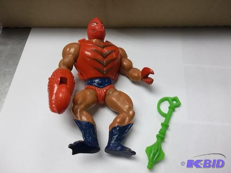 lot 17 image: Vintage Clawful He-Man Action Figure