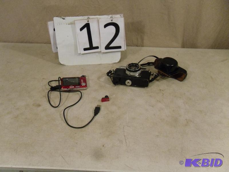 lot 12 image: Lot of 2 Cameras. Vivitar Digital and Vintage...