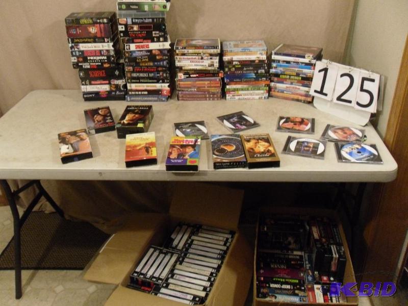 lot 125 image: Large Lot of Assorted DVDS and VHS Tapes. Som...