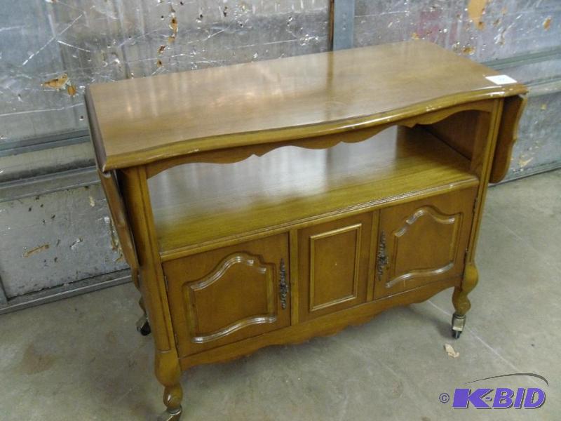 lot 135 image: Vintage Wood Drop Side Buffet on Wheels. Meas...