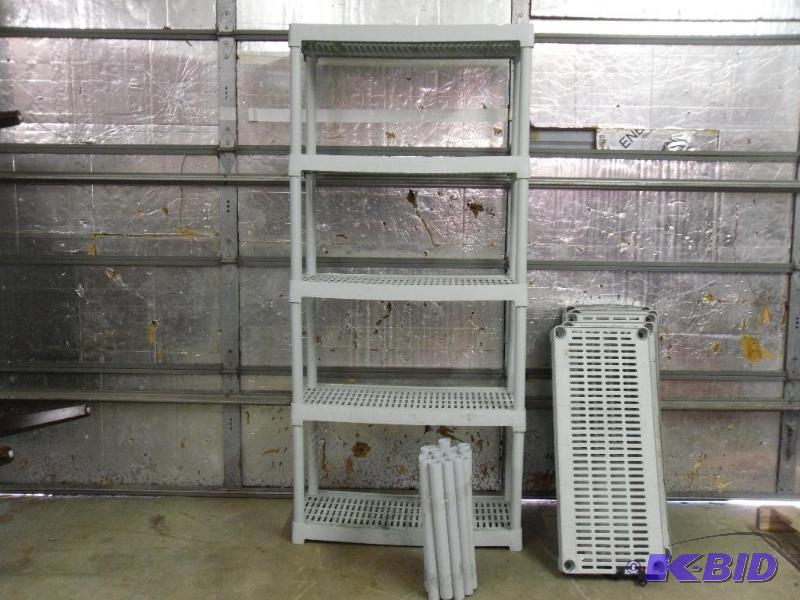 lot 145 image: 2 Matching 5 Tier Plastic Shelves. One is ass...