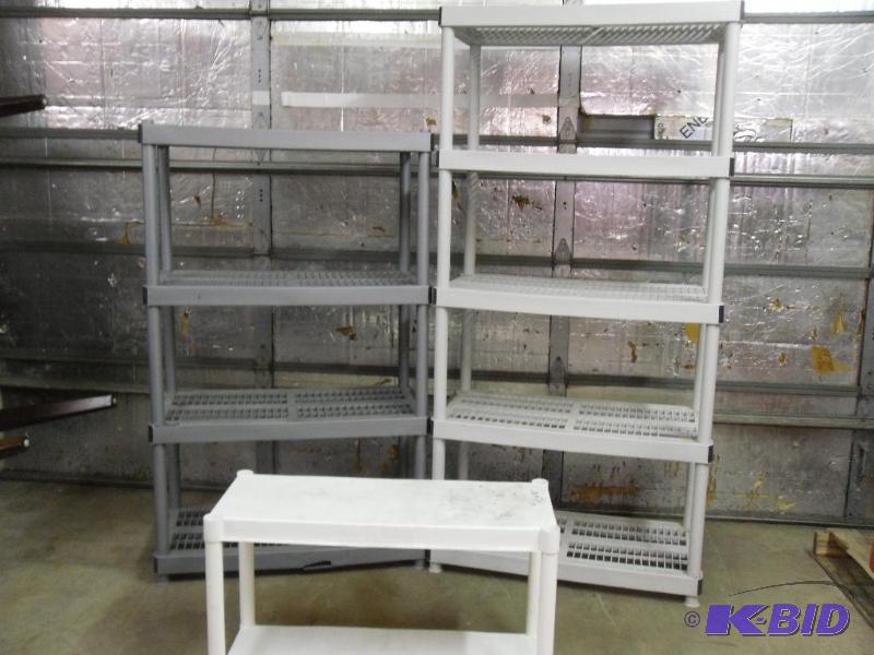 lot 147 image: Lot of Assorted Plastic Shelves. One has a fe...