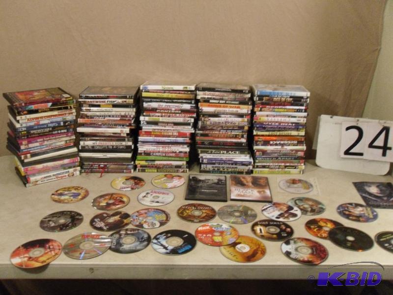 lot 24 image: Large Lot of DVDs. Over 150. Some may need sc...