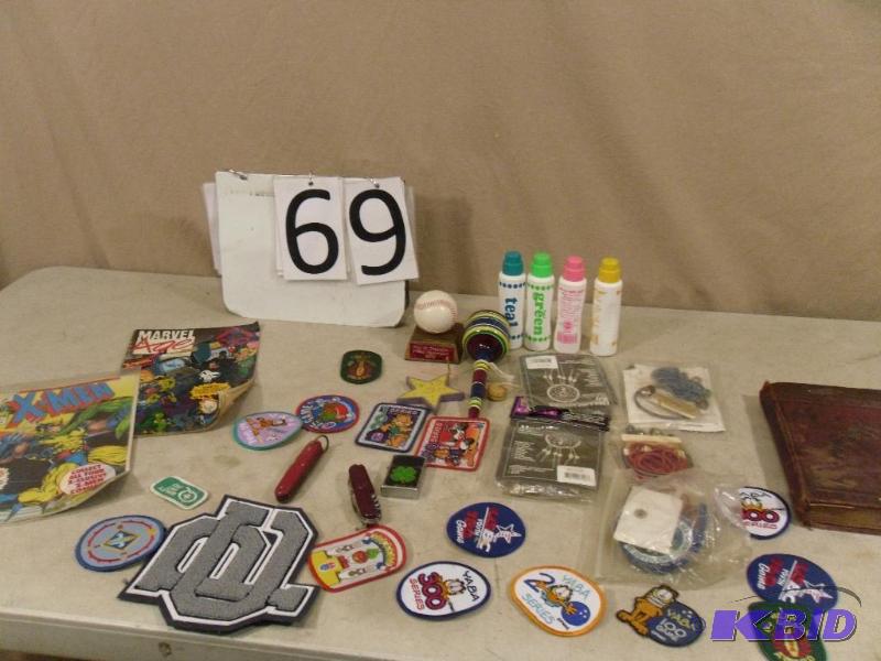 lot 69 image: 2 Comics, 2 Knives, Lighter, Old Book, Patche...