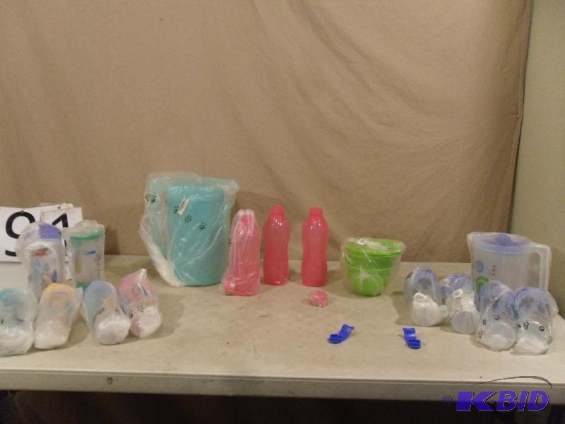 lot 91 image: Lot of New Tupperware Brand Items. Pitchers, ...