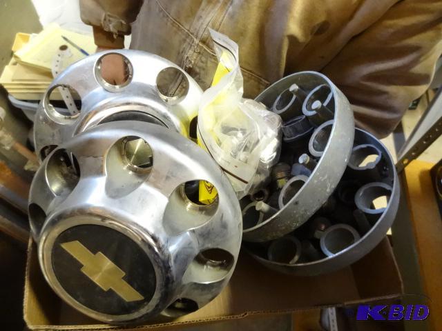 lot 66 image: Chevy Hubcovers Lug Nuts...