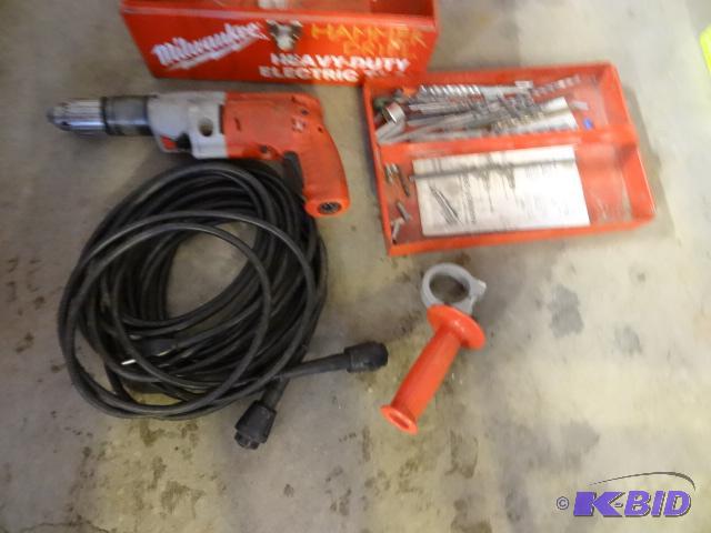 lot 8 image: Milwaukee 12 Magnum Hammer Drill. Includes 2...