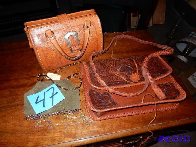 2 leather purses and a small satchel...